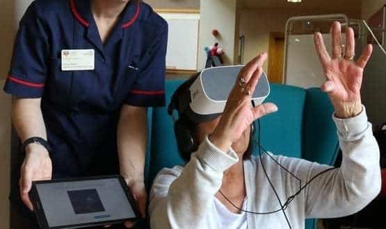 Meadow House patient Joy Pilgrim uses a virtual reality headset