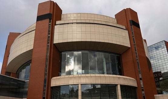 The exterior of Harrogate Convention Centre. A big ol' round building.